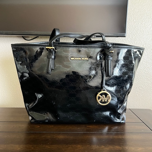 Michael Kors Handbags - Michael Kors Black and Gold Patent MK 
Leather Tote Bag